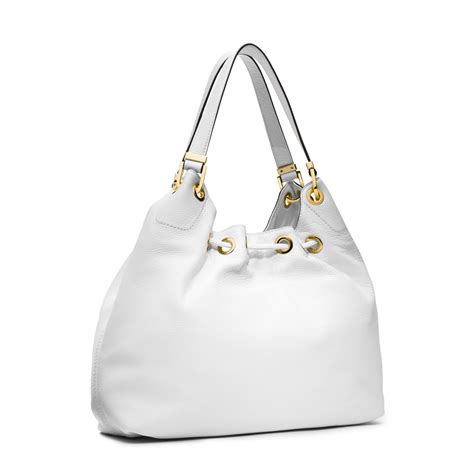 white leather handbags